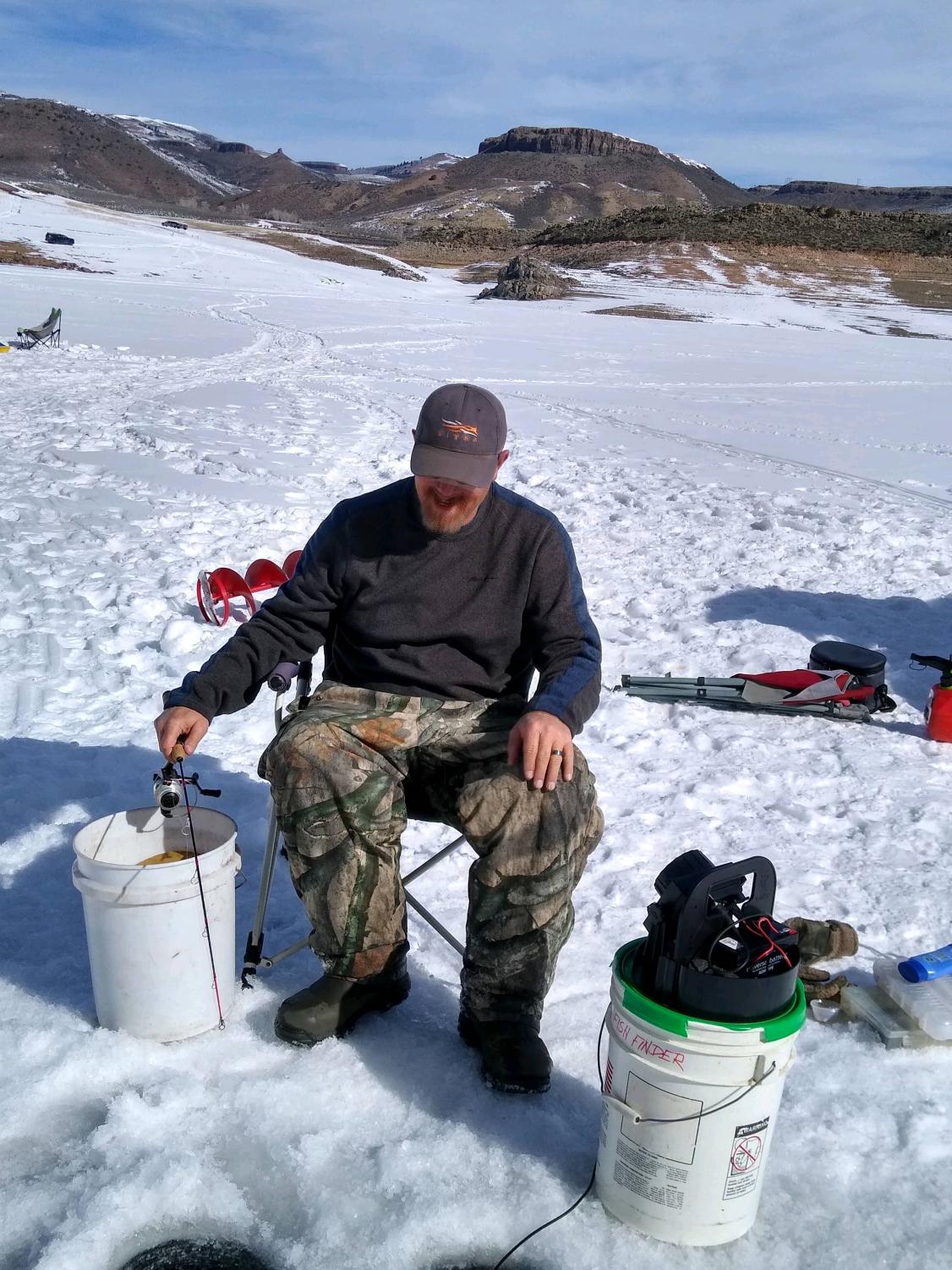 Mr. Percival demonstrates  proper ice fishing technique. 